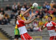 27 June 2015; Eamonn McGee, Donegal, in action against Caolan O'Boyle, Derry. Ulster GAA Football Senior Championship, Semi-Final, Derry v Donegal. St Tiernach's Park, Clones, Co. Monaghan. Picture credit: Oliver McVeigh / SPORTSFILE