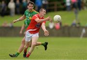 27 June 2015; Dessie Finnegan, Louth, in action against Donal Wrynn, Leitrim. GAA Football All-Ireland Senior Championship, Round 1B, Louth v Leitrim. County Grounds, Drogheda, Co. Louth. Picture credit: Piaras Ó Mídheach / SPORTSFILE
