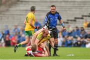 27 June 2015; Neil Gallagher, Donegal, and Niall Holly, Derry, tussle off the ball. Ulster GAA Football Senior Championship, Semi-Final, Derry v Donegal. St Tiernach's Park, Clones, Co. Monaghan. Picture credit: Ramsey Cardy / SPORTSFILE