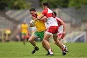 27 June 2015; Martin McElhinney, Donegal, in action against Christopher McKaigue, Derry. Ulster GAA Football Senior Championship, Semi-Final, Derry v Donegal. St Tiernach's Park, Clones, Co. Monaghan. Picture credit: Ramsey Cardy / SPORTSFILE