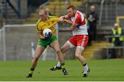 27 June 2015; Neil Gallagher, Donegal, in action against Fergal Doherty, Derry. Ulster GAA Football Senior Championship, Semi-Final, Derry v Donegal. St Tiernach's Park, Clones, Co. Monaghan. Picture credit: Oliver McVeigh / SPORTSFILE