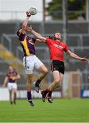 27 June 2015; Syl Byrne, Wexford, in action against Peter Fitzpatrick, Down. GAA Football All-Ireland Senior Championship, Round 1B, Wexford v Down. Innovate Wexford Park, Wexford. Picture credit: Matt Browne / SPORTSFILE