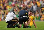 27 June 2015; Donegal's Patrick McBrearty receives treatment for an injury during the first half. Ulster GAA Football Senior Championship, Semi-Final, Derry v Donegal. St Tiernach's Park, Clones, Co. Monaghan. Picture credit: Ramsey Cardy / SPORTSFILE