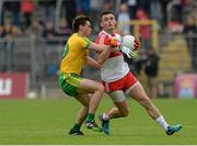 27 June 2015; Eoin Bradley, Derry, in action against Martin Reilly, Donegal. Ulster GAA Football Senior Championship, Semi-Final, Derry v Donegal. St Tiernach's Park, Clones, Co. Monaghan. Picture credit: Oliver McVeigh / SPORTSFILE