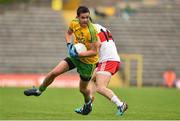 27 June 2015; Odhrán Mac Niallais, Donegal, in action against Eoin Bradley, Derry. Ulster GAA Football Senior Championship, Semi-Final, Derry v Donegal. St Tiernach's Park, Clones, Co. Monaghan. Picture credit: Ramsey Cardy / SPORTSFILE