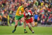 27 June 2015; Oisin Duffy, Derry, is tackled by Colm McFadden, Donegal. Ulster GAA Football Senior Championship, Semi-Final, Derry v Donegal. St Tiernach's Park, Clones, Co. Monaghan. Picture credit: Ramsey Cardy / SPORTSFILE