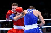 27 June 2015; Michael O'Reilly, Ireland, left, exchanges punches with Xaybula Musalov, Azerbaijan, during their Men's Boxing Middle 75kg Final bout. 2015 European Games, Crystal Hall, Baku, Azerbaijan. Picture credit: Stephen McCarthy / SPORTSFILE