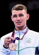 27 June 2015; Sean McComb, Ireland, after being presented with his Men's Boxing Light 60kg bronze medal. 2015 European Games, Crystal Hall, Baku, Azerbaijan. Picture credit: Stephen McCarthy / SPORTSFILE