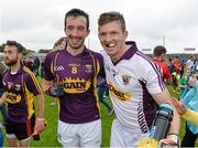 27 June 2015; Wexford's Syl Byrne and Anthony Masterson celebrate after the final whistle. GAA Football All-Ireland Senior Championship, Round 1B, Wexford v Down. Innovate Wexford Park, Wexford. Picture credit: Matt Browne / SPORTSFILE