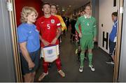 26 June 2015; Luke Evans, Ireland, and Jack Rutter England, wait to lead their teams out ahead of the game. This tournament is the only chance the Irish team have to secure a precious qualifying spot for the 2016 Rio Paralympic Games. 2015 CP Football World Championships, Ireland v England, St. George’s Park, Tatenhill, Burton-upon-Trent, Staffordshire, England. Picture credit: Magi Haroun / SPORTSFILE