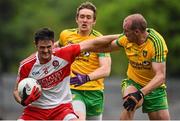 27 June 2015; Christopher McKaigue, Derry, is tackled by Neil Gallagher, Donegal. Ulster GAA Football Senior Championship, Semi-Final, Derry v Donegal. St Tiernach's Park, Clones, Co. Monaghan. Picture credit: Ramsey Cardy / SPORTSFILE