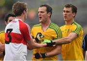 27 June 2015; Donegal's Michael Murphy, centre, and Eamonn McGee, confront Brendan Rogers, Derry. Ulster GAA Football Senior Championship, Semi-Final, Derry v Donegal. St Tiernach's Park, Clones, Co. Monaghan. Picture credit: Ramsey Cardy / SPORTSFILE