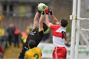 27 June 2015; Paul Durcan, Donegal, in action against Mark Lynch, Derry. Ulster GAA Football Senior Championship, Semi-Final, Derry v Donegal. St Tiernach's Park, Clones, Co. Monaghan. Picture credit: Ramsey Cardy / SPORTSFILE