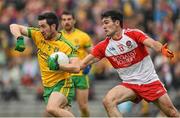 27 June 2015; Mark McHugh, Donegal, in action against Danny Heavron, Derry. Ulster GAA Football Senior Championship, Semi-Final, Derry v Donegal. St Tiernach's Park, Clones, Co. Monaghan. Picture credit: Ramsey Cardy / SPORTSFILE