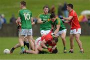 27 June 2015; Bevan Duffy, Louth, involved in a tussle with Seán McWeeney, Leitrim, before being shown the yellow card by referee Ciarán Branagan. GAA Football All-Ireland Senior Championship, Round 1B, Louth v Leitrim. County Grounds, Drogheda, Co. Louth. Picture credit: Piaras Ó Mídheach / SPORTSFILE