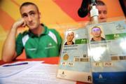 11 September 2008; Irish Paralympian Derek Malone, from Whitegate, Co. Clare, displays his newly acquired Administrative Personnel Accreditation, left, alongside his Athletes Accreditation, at a Paralympic Council of Ireland Press Conference to address the issue of his being ruled ineligible to play in the 7-A-Side soccer competition by CP-ISRA (Cerebral Palsy International Sports and Recreation Association). The PCI called the conference as they have major concerns over the ruling. Malone is strength and conditioning coach to the Irish team and will remain resident with his team mates in the Paralympic village. Beijing Paralympic Games 2008, Paralympic Council of Ireland Press Conference, Main Press Centre, Olympic Green, Beijing, China. Picture credit: Brian Lawless / SPORTSFILE