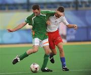 12 September 2008; Ireland's Alan O'Hara, from Portrane, Dublin, in action against Kieran Martin, Great Britain. The match ended in a 1-1 draw and means Ireland will face China in a classification match this coming Sunday 14th. Beijing Paralympic Games 2008, Ireland v Great Britain, 7-A-Side Soccer, First Round, Group B, Match 12, Olympic Green Hockey Field A, Beijing, China. Picture credit: Brian Lawless / SPORTSFILE