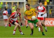 27 June 2015; Michael Murphy, Donegal, in action against Brendan Rogers, Derry. Ulster GAA Football Senior Championship, Semi-Final, Derry v Donegal. St Tiernach's Park, Clones, Co. Monaghan. Picture credit: Oliver McVeigh / SPORTSFILE