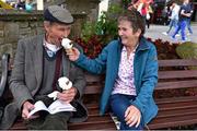 28 June 2015; Michael and Cathleen Hannon of Thurles Pass, Co. Westmeath, enjoy an ice cream before the races. Curragh Derby Festival. The Curragh, Co. Kildare. Picture credit: Cody Glenn / SPORTSFILE