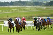 28 June 2015; Sanus Per Aquam, second from left, with Kevin Manning up, ahead of Lieutenant General, left, with Donnacha O'Brien up, on their way to winning the Barronstown Stud E.B.F. (C & G) Maiden. Curragh Derby Festival. The Curragh, Co. Kildare. Picture credit: Cody Glenn / SPORTSFILE