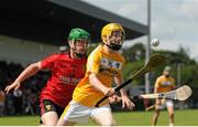 28 June 2015; Ryan McKee, Antrim, in action against Ciaran Monan, Down. Electric Ireland Ulster GAA Hurling Minor Championship, Semi-Final, Derry v Down. Owenbeg, Derry. Picture credit: Seb Daly / SPORTSFILE