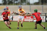 28 June 2015; James McNaughton, Antrim, in action against Donal O'Rooney and Ciaran Monon, Down. Electric Ireland Ulster GAA Hurling Minor Championship, Semi-Final, Derry v Down. Owenbeg, Derry. Picture credit: Seb Daly / SPORTSFILE