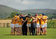 28 June 2015; The Antrim team huddle before the start of the match. Electric Ireland Ulster GAA Hurling Minor Championship, Semi-Final, Derry v Down. Owenbeg, Derry. Picture credit: Seb Daly / SPORTSFILE