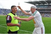 28 June 2015; Westmeath selector Gary Connaughton goes to celebrate with manager Tom Cribbin after the game. Leinster GAA Football Senior Championship, Semi-Final, Westmeath v Meath. Croke Park, Dublin. Picture credit: Dáire Brennan / SPORTSFILE
