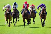 28 June 2015; Most Beautiful, with Ryan Moore up, on their way to winning the Grangecon Stud Stakes. Curragh Derby Festival. The Curragh, Co. Kildare. Picture credit: Cody Glenn / SPORTSFILE