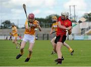 28 June 2015; Conal Cunning, Antrim, in action against Ciaran Monan, Down. Electric Ireland Ulster GAA Hurling Minor Championship, Semi-Final, Derry v Down. Owenbeg, Derry. Picture credit: Seb Daly / SPORTSFILE