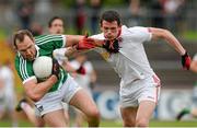 28 June 2015; Tom Lee, Limerick, in action against Aidan McCrory, Tyrone. GAA Football All-Ireland Senior Championship, Round 1B, Tyrone v Limerick. Healy Park, Omagh, Co. Tyrone. Picture credit: Oliver McVeigh / SPORTSFILE