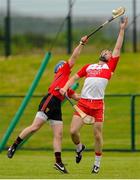 28 June 2015; Conor Quinn, Derry, in action against Danny Toner, Down. Ulster GAA Hurling Senior Championship, Semi-Final, Derry v Down. Owenbeg, Derry. Picture credit: Seb Daly / SPORTSFILE