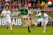 28 June 2015; Brian Fanning, Limerick, in action against Ronan O'Neill and Rory Brennan, Tyrone. GAA Football All-Ireland Senior Championship, Round 1B, Tyrone v Limerick. Healy Park, Omagh, Co. Tyrone. Picture credit: Oliver McVeigh / SPORTSFILE