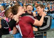 28 June 2015; Ger Egan, Westmeath captain, celebrates with supporters at the end of the game. Leinster GAA Football Senior Championship, Semi-Final, Westmeath v Meath. Croke Park, Dublin. Picture credit: David Maher / SPORTSFILE