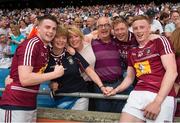 28 June 2015; Westmeath players John Connellan, left, and his brother Ray, right, are congratulated by their mam, Mary, sister, Eimer, dad Paul and brother David after the game. Leinster GAA Football Senior Championship, Semi-Final, Westmeath v Meath. Croke Park, Dublin. Picture credit: Ray McManus / SPORTSFILE