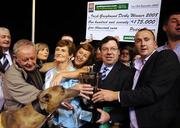 13 September 2008; An Taoiseach, Brian Cowen, T.D presents the winning trophy to owner Noel Hehir after Shelbourne Aaston had won the Paddy Power Irish Greyhound Derby. Paddy Power Irish Greyhound Derby, Shelbourne Park, Ringsend, Dublin. Picture credit; Damien Eagers / SPORTSFILE