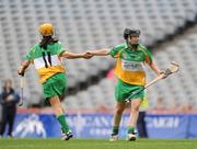 14 September 2008; Arlene Watkins, Offaly, is congratulated by team-mate Tina Hannon, 11, after scoring her side's first goal. Gala All-Ireland Junior Camogie Championship Final, Clare v Offaly, Croke Park, Dublin. Picture credit: Stephen McCarthy / SPORTSFILE *** Local Caption ***
