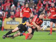 14 September 2008; Tomas O'Leary, Munster, loses possession close to the try line while being tackled by Tal Selley, Newport Gwent Dragons. Magners League, Munster v Newport Gwent Dragons, Musgrave Park, Cork. Picture credit: Brendan Moran / SPORTSFILE *** Local Caption ***