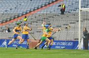 14 September 2008; Shonagh Enright, Clare, right, watches her shot cross the line to score her side's winning goal in the the final minutes of the game. Gala All-Ireland Junior Camogie Championship Final, Clare v Offaly, Croke Park, Dublin. Picture credit: Stephen McCarthy / SPORTSFILE