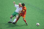 14 September 2008; Ireland's Paul Dollard, from Rathfarnham, Dublin, in action against Guojun Xu, China. Ireland won the match 4-1 and will play Holland in a classification match to decide 5th and 6th place this coming Tuesday 16th. Beijing Paralympic Games 2008, Ireland v China, 7-A-Side Soccer, Classification 5-8, Match 14, Olympic Green Hockey Field A, Beijing, China. Picture credit: Brian Lawless / SPORTSFILE