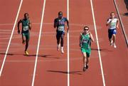 15 September 2008; Ireland's Jason Smyth, from Eglinton, Co. Derry, in action against, from left, Jonathan Ntutu, South Africa, Royal Mitchell, USA, and Neill Fachie, Great Britain, during the Men's 200m -T13 heats. Smyth who already bagged gold for the Men's 100m T13 Final setting a world record of 10.62 again set a new world record time of 21.81 sec taking .02 of a second off his own record set in Holland in 2006. The final of the Men's 200m will take place tomorrow Tuesday 16th. Beijing Paralympic Games 2008, Men's 200m -T13, Heat 1, National Stadium, Olympic Green, Beijing, China. Picture credit: Brian Lawless / SPORTSFILE