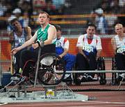 15 September 2008; Ireland's John McCarthy, from Dunmanway, Co. Cork, focuses during the Men's Club Throw - F32/51 as the other competitors watch from outside the net. McCarthy finished in 11th place overall with a distance of  19.53m. Beijing Paralympic Games 2008, Men's Club Throw - F32/51, National Stadium, Olympic Green, Beijing, China. Picture credit: Brian Lawless / SPORTSFILE