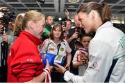 29 June 2015; Katie Taylor, Team Ireland, signs an autograph for Sophie Clancy, 12, of St. Josephs Boxing Club, Edenderry, on her return from the 2015 Baku European Games. Terminal One, Dublin Airport. Picture credit: Cody Glenn / SPORTSFILE