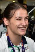 29 June 2015; Katie Taylor, Team Ireland, is interviewed on her return from the 2015 Baku European Games. Terminal One, Dublin Airport. Picture credit: Cody Glenn / SPORTSFILE