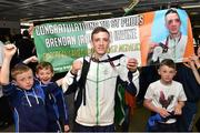 29 June 2015; Brendan Irvine, Men's Boxing Light Fly 49kg silver, Team Ireland, is greeted by fans on his return from the 2015 Baku European Games. Terminal One, Dublin Airport.  Picture credit: Cody Glenn / SPORTSFILE
