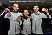 29 June 2015; Sam Magee, left, Chloe Magee and Joshua Magee, Ireland, with their bronze medals for Badminton Men's and Mixed Doubles on their return from the 2015 Baku European Games. Terminal One, Dublin Airport.  Picture credit: Cody Glenn / SPORTSFILE