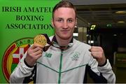 29 June 2015; Michael O'Reilly, Men's Boxing Middle 75kg gold, Team Ireland, holds up his gold medal on his return from the 2015 Baku European Games. Terminal One, Dublin Airport. Picture credit: Cody Glenn / SPORTSFILE