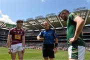 28 June 2015; Referee Conor Lane with captains Ger Egan, left, Westmeath, and Donal Keogan, Meath. Leinster GAA Football Senior Championship, Semi-Final, Westmeath v Meath. Croke Park, Dublin. Picture credit: David Maher / SPORTSFILE