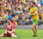 27 June 2015; Barry Grant, Derry, taunts Stephen McMenamin, Donegal after winning a free.  Electric Ireland Ulster GAA Football Minor Championship, Semi Final, Derry v Donegal. St Tiernach's Park, Clones, Co. Monaghan. Picture credit: Ramsey Cardy / SPORTSFILE