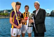 30 June 2015; Kilkenny’s Conor Martin and Wexford’s Conor McDonald were at Grand Canal Dock in Dublin today ahead of the Bord Gáis Energy GAA Hurling U-21 Leinster Championship Final at Wexford Park on Wednesday, July 8th at 7.30pm. The match will be shown live on TG4 with fans able to vote for their man of the match using the #laochBGE hashtag on Twitter. Pictured is Bord Gáis Energy sports ambassador Ger Cunningham, right, with Wexford’s Conor McDonald, left, and  Kilkenny’s Conor Martin. Grand Canal Dock, Dublin. Picture credit: Ramsey Cardy / SPORTSFILE